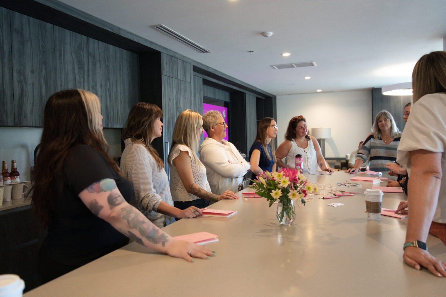 Writers around the table at the start of the day