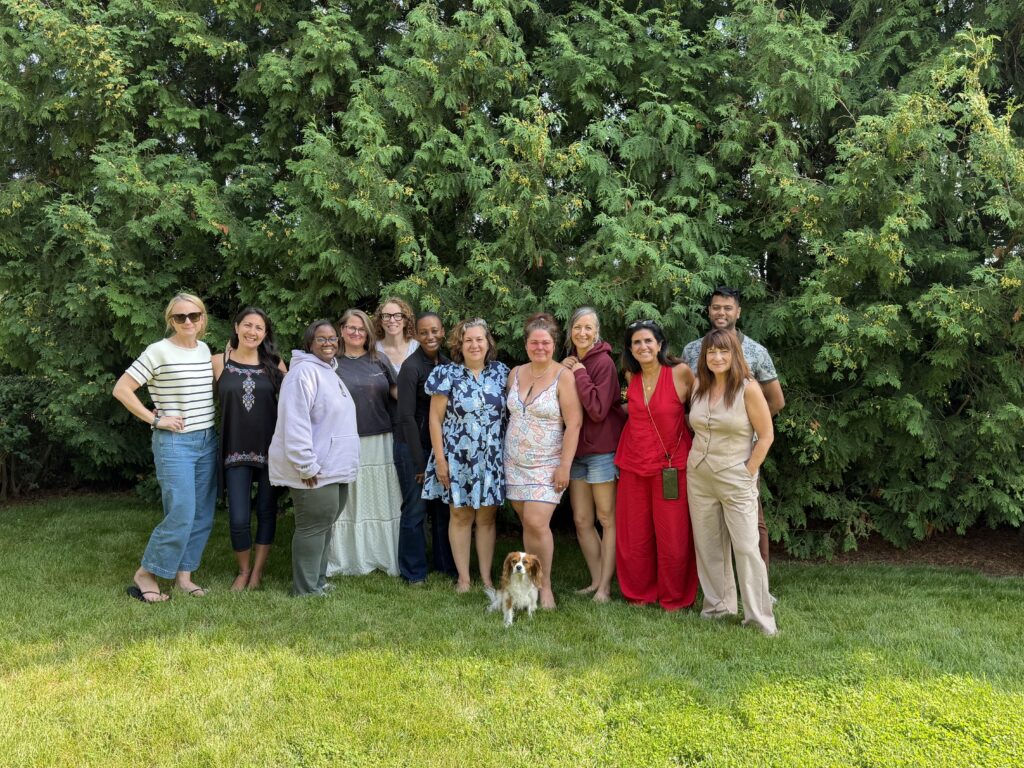 Createcation retreat group photographed together outdoors on the final day