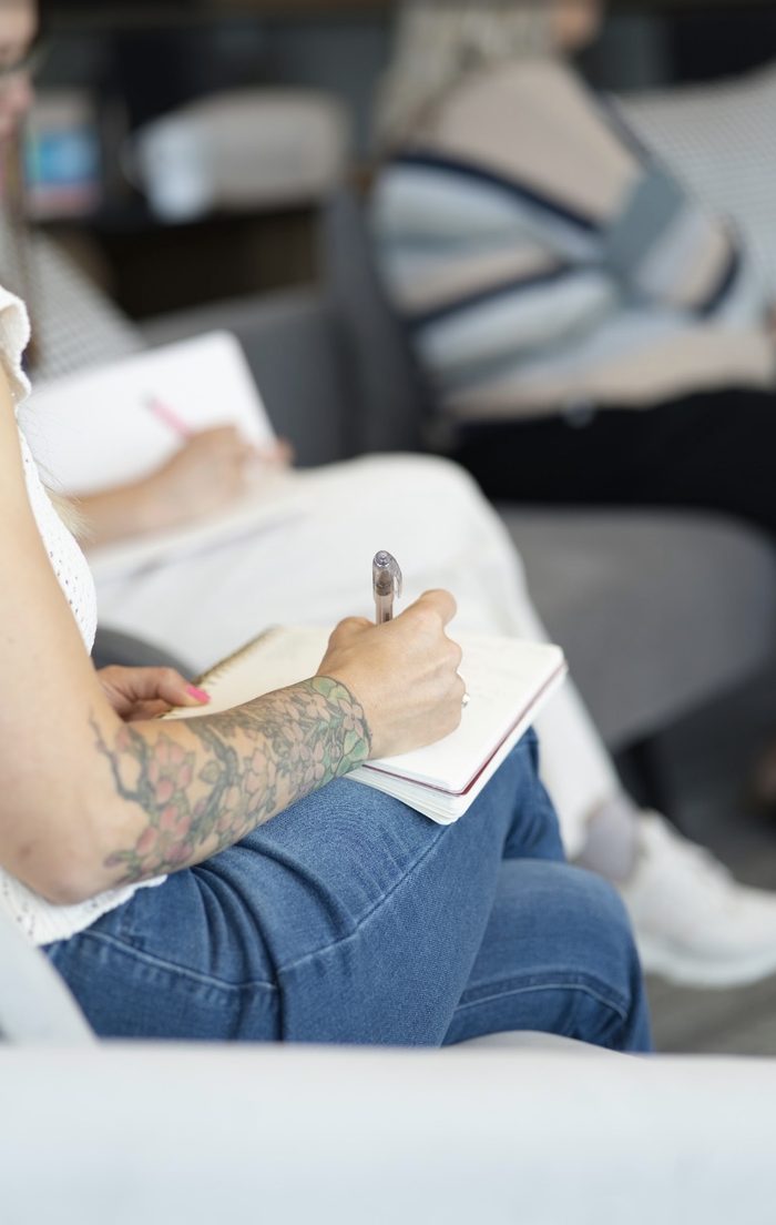A writer working in her notebook