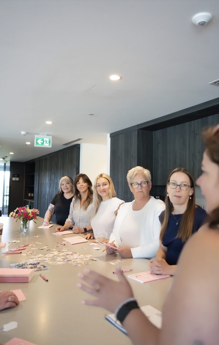 Writers around the table at the start of a retreat